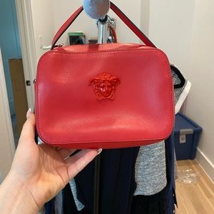 Versace purse crossbody,open for trades